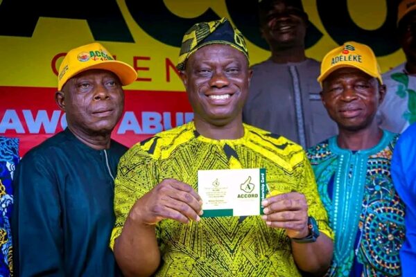 Bamidele Salam Receives Accord Membership Card